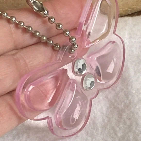 Coach Pink Acrylic Butterfly Charm with Jewels and Script Branding - Picture 3 of 5